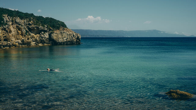 woman swimming in the sea in Sardinia