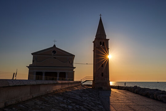 The church dedicated to the Madonna dell'Angeloat summer sunrise, caorle Italy. 