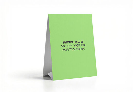 Vertical table tent mockup with foldable stand on white surface, realistic graphic design presentation for branding, advertising, or print display, template artwork placement