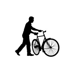 Fototapeta premium Man walking while pushing a bicycle silhouette isolated