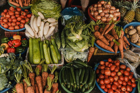 Fresh vegetable display at local market in Vietnam