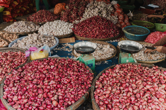 Traditional market stall with shallot garlic and onion in Vietnam