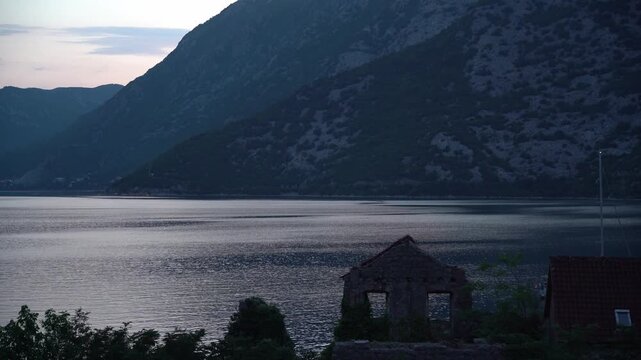 Evening seacoast, peaceful Adriatic landscape under warm twilight light
