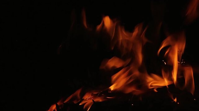 Real fire flame burning on isolated black background close up overlay