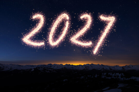 2027 Firework sparke text on sky for New Year concept.