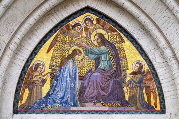 Fototapeta premium The Coronation of the Virgin Mary – mosaic on the pediment of Santa Maria del Rosario Church in Rome, Italy.