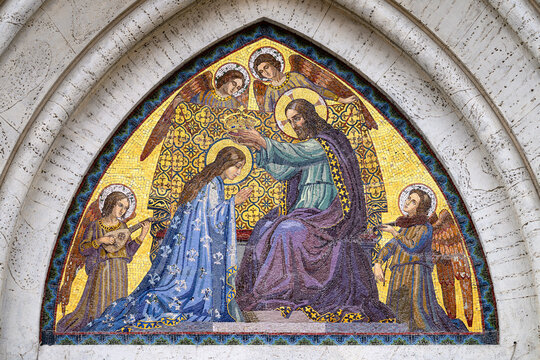 The Coronation of the Virgin Mary &ndash; mosaic on the pediment of Santa Maria del Rosario Church in Rome, Italy.