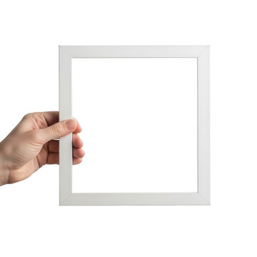 Hand holding empty picture frame against transparent background