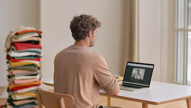 Video call at home with laundry in background for remote work embarrassment concept