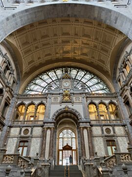 Antwerp Central Station Interior Architecture, Famous Railway Cathedral Hall with Monumental Clock and Domed Roof, Belgium