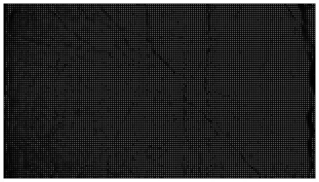 Monochrome halftone grid pattern soft dark gradient.