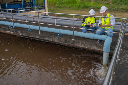 Environmental engineers work at wastewater treatment plants,Water supply engineering working at Water recycling plant for reuse