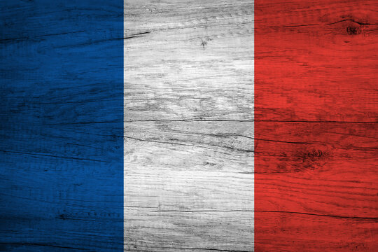 France flag - realistic looking flag on a wooden surface