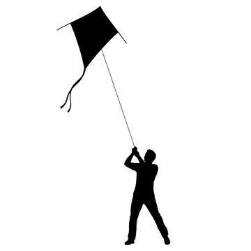 Silhouette of a man flying a kite against a white background