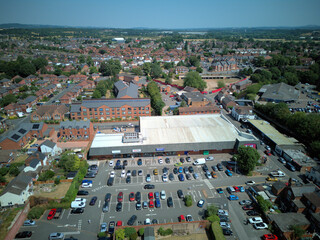 Aerial drone view of Stourport-on-Severn town centre, Worcestershire, England. Bird's eye perspective of the historic market town, streets, red brick buildings, and surrounding landscape. © Xander Multimedia