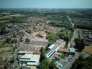 Aerial drone view of Stourport-on-Severn town centre, Worcestershire, England. Bird's eye perspective of the historic market town, streets, red brick buildings, and surrounding landscape. © Xander Multimedia