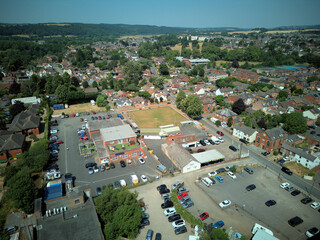 Aerial drone view of Stourport-on-Severn town centre, Worcestershire, England. Bird's eye perspective of the historic market town, streets, red brick buildings, and surrounding landscape. © Xander Multimedia