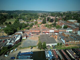 Aerial drone view of Stourport-on-Severn town centre, Worcestershire, England. Bird's eye perspective of the historic market town, streets, red brick buildings, and surrounding landscape. © Xander Multimedia