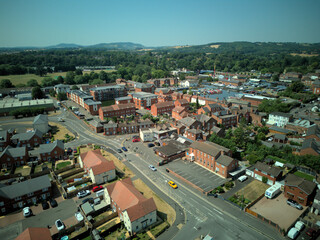Aerial drone view of Stourport-on-Severn town centre, Worcestershire, England. Bird's eye perspective of the historic market town, streets, red brick buildings, and surrounding landscape. © Xander Multimedia
