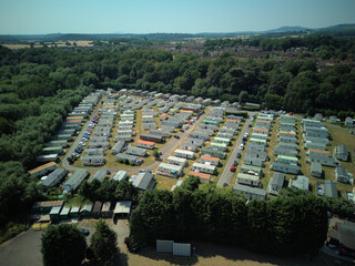 Aerial drone view of Stourport-on-Severn town centre, Worcestershire, England. Bird's eye perspective of the historic market town, streets, red brick buildings, and surrounding landscape. © Xander Multimedia