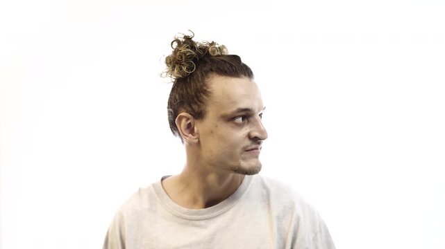 Man Showing Contempt and Disdainful Expression on White Background