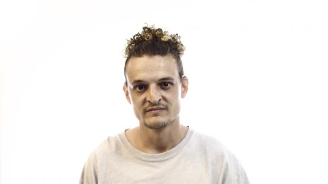 Man Showing Contempt and Disdainful Expression on White Background