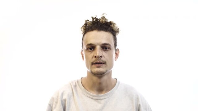 Man Showing Contempt and Disdainful Expression on White Background