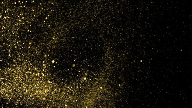 Gold ink in water shooting with high speed camera. Gold glitter background with sparkle shine light confetti. Super Slow Motion at 1000fps. effect.