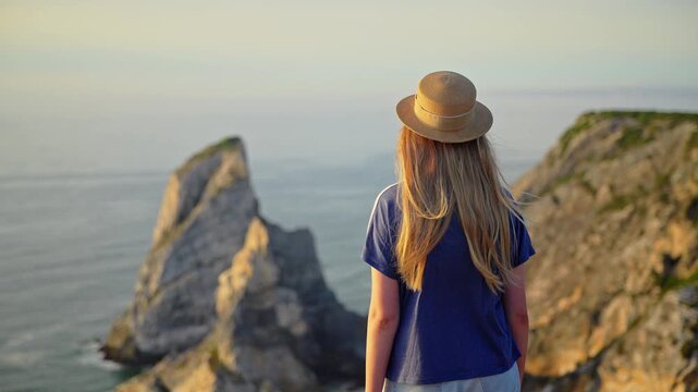 Young Tourist Admiring Rocky Atlantic Coast in Portugal