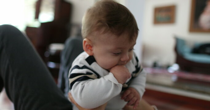 Baby toddler with mother in casual candid scene