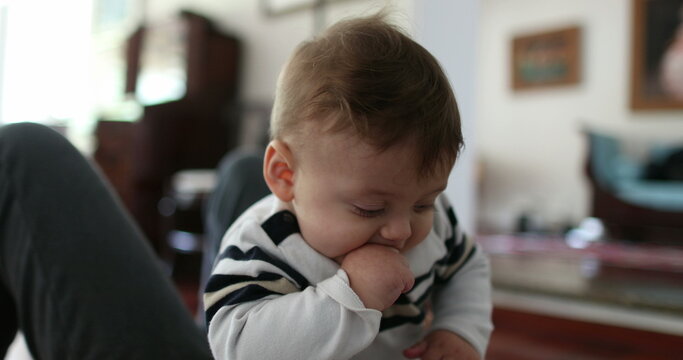 Baby toddler with mother in casual candid scene