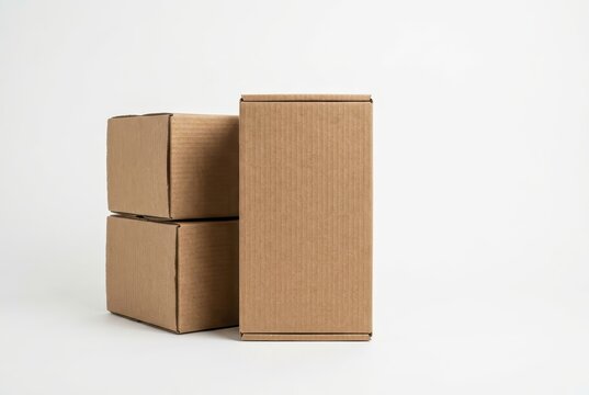 Stack of Brown Cardboard Boxes for Shipping, Delivery, and Storage Isolated on White Background