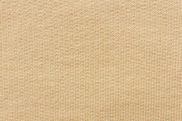 Beige loopback knit fabric face texture © Iryna Miadzvedzeva