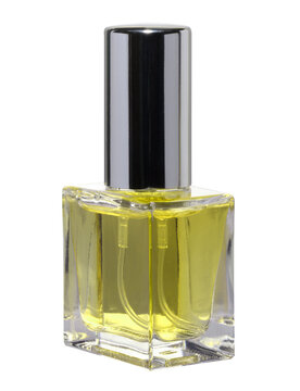 Glass rectangular bottle with yellow perfume liquid and shiny chrome cap