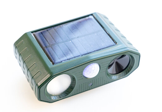 Green Solar Powered Ultrasonic Animal Repeller on White Background
