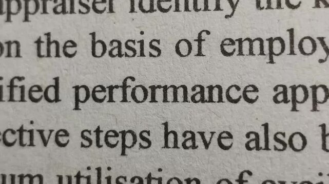 Extreme closeup of performance word or text printed on news articles, book or magazine white page emphasize and highlight. Performance increase in work, business and industry motivation concept.