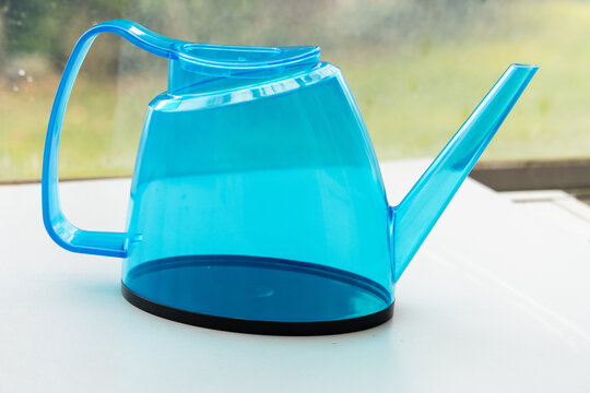 Clear Blue Plastic Watering Can for Indoor and Outdoor Plants