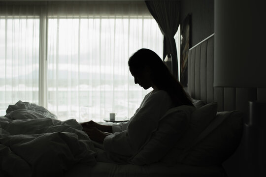 Unhappy woman at home suffering from depression, sadness, divorce, loneliness.	