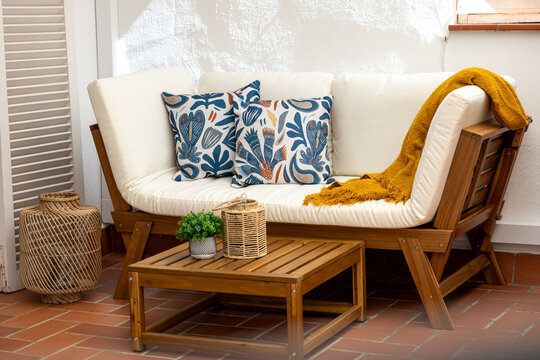 Inviting vacation rental terrace with wooden outdoor furniture