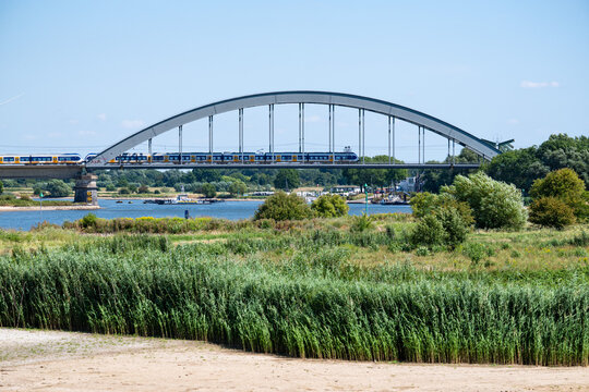 Railway arch bridge over the Lek floodplain near Culemborg.