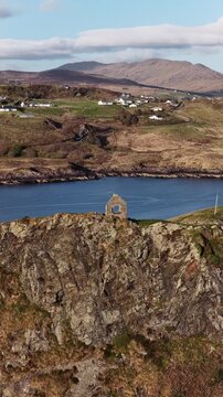 Aerial view of the remaining wall of the old coastguard station in Teelin, County Donegal, Ireland