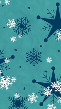 Animation of snowflakes falling on green background at christmas