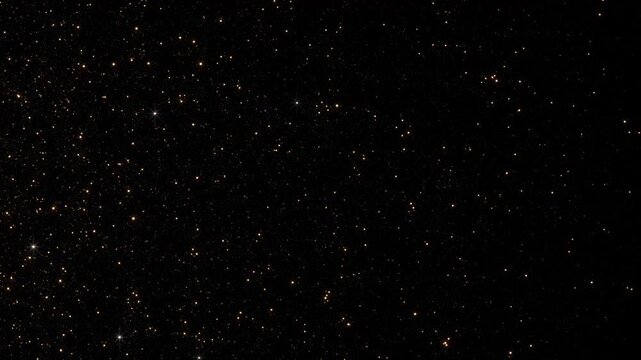 Thousands of golden glitter particles luxurious sparkling frame black copy space. wedding titles, award shows, holiday greetings, beauty advertising, premium branding, invitations elegant celebration