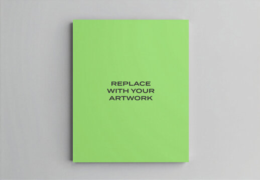Vertical book cover mockup displayed on a flat surface with centered text placeholder, minimalist design template for editorial and branding projects, clean presentation white background