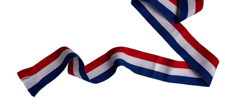 Red, white, and blue striped ribbon with fringes, creating a patriotic or celebratory concept on transparent background