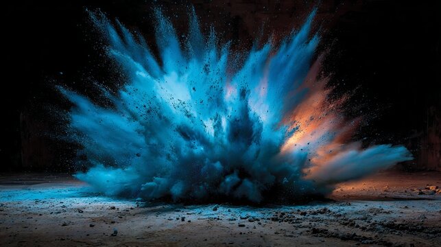 Vibrant blue powder explosion creates a dramatic cinematic cloud effect against a dark background with sharp texture and artistic lighting