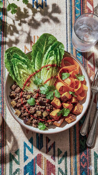Beef lettuce wraps bowl with sweet potato and carrots
