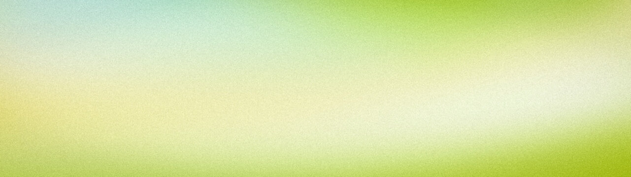 Abstract grainy gradient background with light green pale yellow and mint for wide tech wallpaper banner