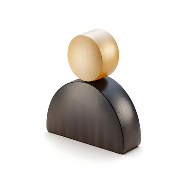 Abstract sculpture featuring a gold circular disc balanced on a dark semicircle wooden block