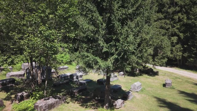 Aerial Drone Shot Ascending Above Bijambare Stecci Necropolis Obscured by Forest Trees, Bosnia and Herzegovina